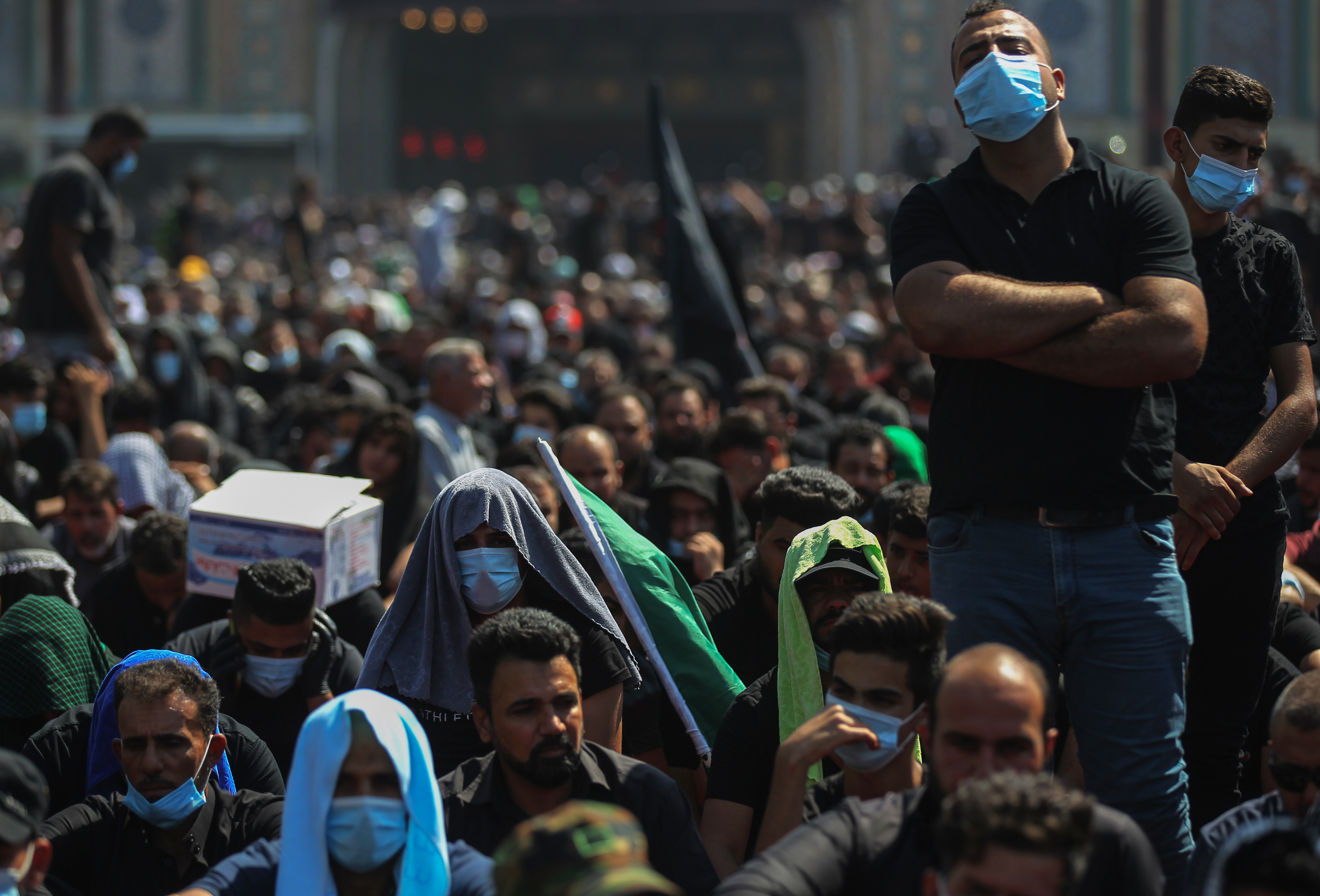 Iraqi Shia Muslims take part in a mourning ritual on the tenth day of the month of Muharram which marks the peak of Ashura, amid the COVID-19 pandemic, in the holy city of Karbala, August 30, 2020. (Photo: Ahmad al-Rubaye/AFP)